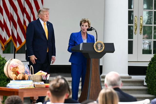 US President Donald Trump looks on as US Secretary of Education Linda McMahon apeaks in the Rose Garden of the White House in Washington, DC, on August 24, 2026. (Photo by Jim WATSON / AFP)