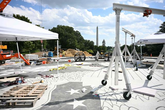 The construction site of a helipad is seen on the South Lawn of the White House during an event with US President Donald Trump in Washington, DC, on August 24, 2026. (Photo by Jim WATSON / AFP)
