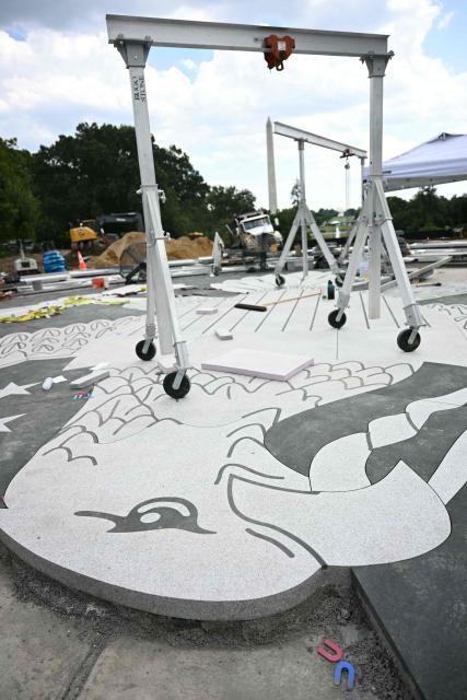 The construction site of a helipad is seen on the South Lawn of the White House during an event with US President Donald Trump in Washington, DC, on August 24, 2026. (Photo by Jim WATSON / AFP)