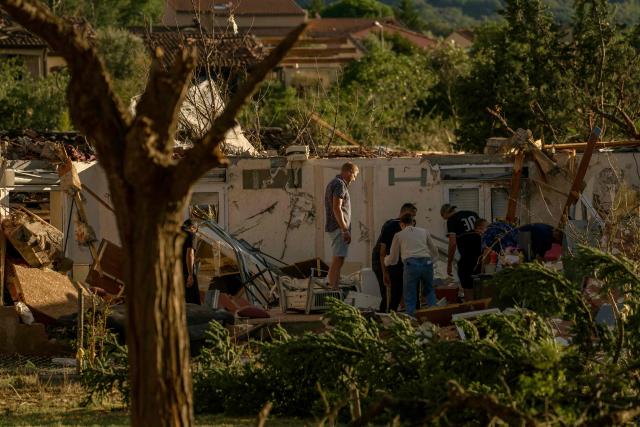 This photograph taken on August 24, 2026, shows a damaged structure after a tornado struck Pomas, southwestern France. A tornado struck the Aude department on August 24 as part of southwestern France remained under an orange storm alert, with several rooftops torn off in the village of Pomas, an AFP photographer at the scene reported. (Photo by Idriss Bigou-Gilles / AFP)