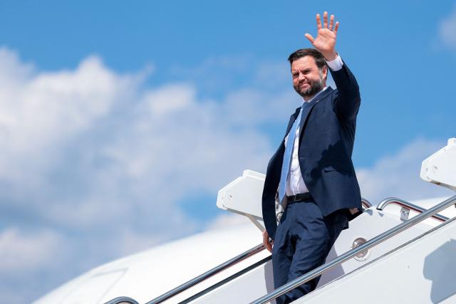 US Vice President JD Vance waves as he steps off Air Force Two on August 24, 2026 in Joint Base Andrews, Maryland. Vance traveled to Maine to speak at CompoTech, a defense technology company. (Photo by Anna Moneymaker / POOL / AFP)