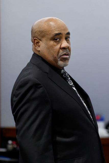 Duane Davis looks on during his murder trial, related to the 1996 killing of rapper Tupac Shakur, at Clark County District Court at the Regional Justice Center in Las Vegas, Nevada, on August 24, 2026. The trial of the former gang leader accused of orchestrating the murder of rapper Tupac Shakur began on August 10, 30 years after one of America's most high-profile unresolved killings. The proceedings, expected to last a month, will likely not make clear who fired the shots that killed the California hip-hop legend on the night of September 7, 1996, while he was in Las Vegas to see a Mike Tyson boxing match. (Photo by Caroline Brehman / POOL / AFP)