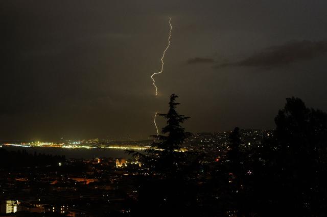 Lightning strikes over the Bay of Angels in the French Riviera city of Nice, southeastern France, on August 24, 2026. (Photo by Valery HACHE / AFP)
