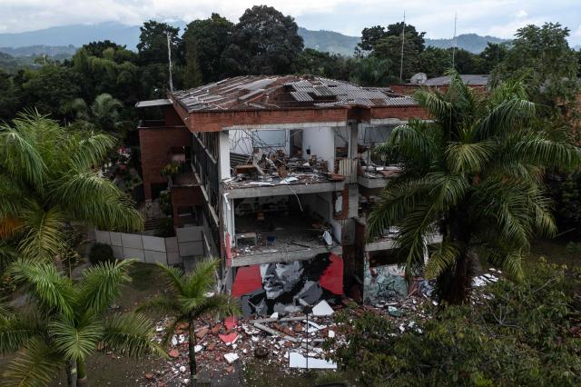 This aerial view shows the rubble and debris of a collapsed building 14 days after the 7.4-magnitude earthquake in Pereira, Colombia on August 24, 2026. The powerful earthquake that killed hundreds of people in western Colombia on August 10, 2026, caused $9.57 billion in economic losses, President Abelardo de la Espriella said on August 18, issuing a preliminary estimate. The death toll stands at 289, with a further 4,187 injured and 143 missing. (Photo by ESTEBAN VEGA LA-ROTTA / AFP)