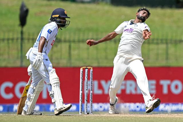 India's Mohammed Siraj (R) delivers a ball as Sri Lanka's Pasindu Sooriyabandara watches during the third day of the second Test cricket match between Sri Lanka and India at the Sinhalese Sports Club Ground in Colombo on August 25, 2026. (Photo by Ishara S. KODIKARA / AFP)