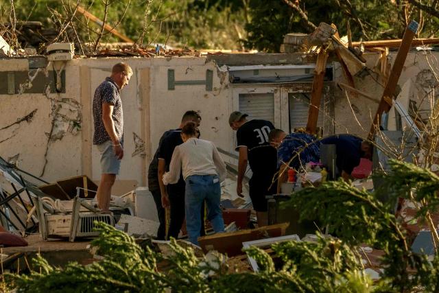 This photograph taken on August 24, 2026, shows a damaged structure after a tornado struck Pomas, southwestern France. A tornado struck the Aude department on August 24 as part of southwestern France remained under an orange storm alert, with several rooftops torn off in the village of Pomas, an AFP photographer at the scene reported. (Photo by Idriss Bigou-Gilles / AFP)