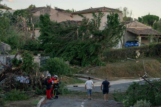 This photograph taken on August 24, 2026, shows damaged houses and toppled trees after a tornado struck Pomas, southwestern France. A tornado struck the Aude department on August 24 as part of southwestern France remained under an orange storm alert, with several rooftops torn off in the village of Pomas, an AFP photographer at the scene reported. (Photo by Idriss Bigou-Gilles / AFP)