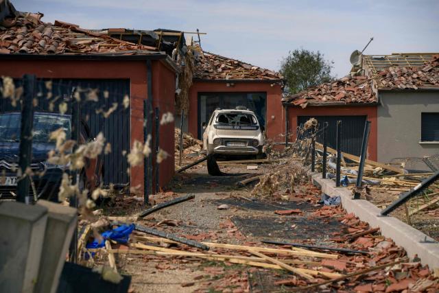 This photograph shows damaged residential buildings following a tornado in Pomas, southwestern France on August 25, 2026. A tornado struck the Aude department on August 24, 2026. In the aftermath of a violent tornado, the village of Pomas (Aude) was taking stock of the damage on August 25, 2026: there were 39 people injured, two of whom were in a critical condition, and 300 homes affected, according to the prefecture. (Photo by Idriss Bigou-Gilles / AFP)