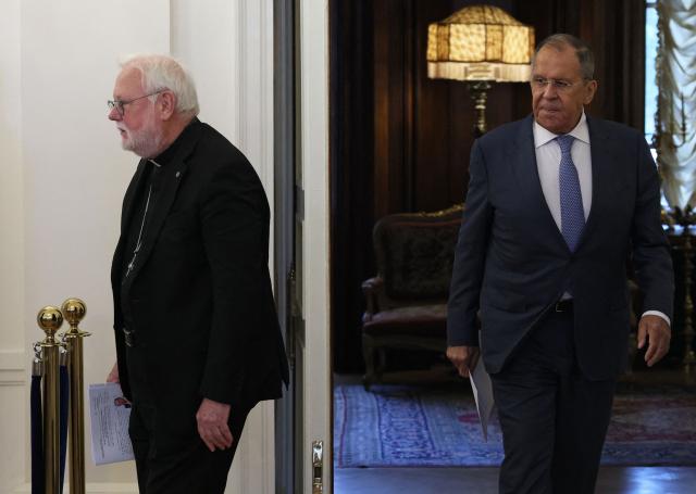 Archbishop Paul Richard Gallagher, Vatican envoy and Secretary for Relations with States and International Organisations of the Holy See, and Russian Foreign Minister Sergei Lavrov arrive for a meeting in Moscow on August 25, 2026. (Photo by Ramil Sitdikov / POOL / AFP)