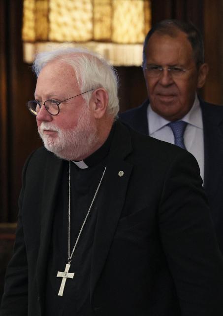 Archbishop Paul Richard Gallagher, Vatican envoy and Secretary for Relations with States and International Organisations of the Holy See, and Russian Foreign Minister Sergei Lavrov arrive for a meeting in Moscow on August 25, 2026. (Photo by Ramil Sitdikov / POOL / AFP)
