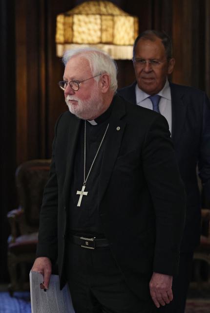 Archbishop Paul Richard Gallagher, Vatican envoy and Secretary for Relations with States and International Organisations of the Holy See, and Russian Foreign Minister Sergei Lavrov arrive for a meeting in Moscow on August 25, 2026. (Photo by Ramil Sitdikov / POOL / AFP)
