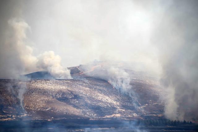 Smoke rises from fires ignited by Israeli shelling that targeted the plain of Marjayoun in southern Lebanon on August 25, 2026. Lebanon was drawn into the Middle East war on March 2, when pro-Iran Hezbollah launched rockets towards Israel in response to US-Israeli strikes that killed Iranian supreme leader on February 28, 2026. Despite a November 2024 ceasefire that was supposed to end more than a year of hostilities between Israel and the Iran-backed Hezbollah group, Israel has kept up strikes on Lebanon and has maintained troops in areas in southern Lebanon it deems strategic. (Photo by AFP) / 