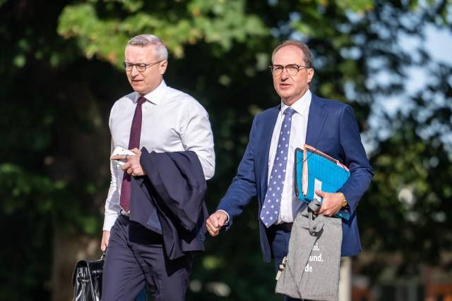 German Interior Minister Alexander Dobrindt (R) and German Minister for Digitalization and State Modernization Karsten Wildberger arrive for the start of the second day of a two day retreat meeting of the German cabinet on August 26, 2026 in Neuhardenberg, northeastern Germany. (Photo by Michael Kappeler / POOL / AFP)