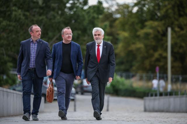 (R-L) Social Democratic Party's (SPD) main candidate in the Saxony-Anhalt state election Armin Willingmann arrives with his spokespersons Rene Woelfer and Matthias Stoffregen for a debate on MDR regional TV in Magdeburg, eastern Germany on August 26, 2026. Saxony-Anhalt will go to the polls in the regional elections on September 6, 2026. (Photo by Ronny HARTMANN / AFP)