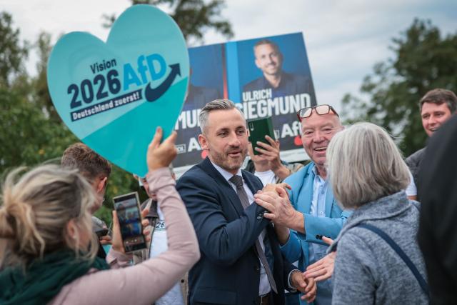 Far-right Alternative for Germany (AfD) party's main candidate Ulrich Siegmund arrives for a debate on MDR regional TV in Magdeburg, eastern Germany on August 26, 2026. Saxony-Anhalt will go to the polls in the regional elections on September 6, 2026. (Photo by Ronny HARTMANN / AFP)