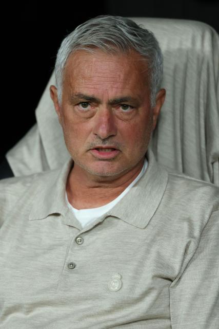 Real Madrid's Portuguese coach Jose Mourinho looks on during the Spanish league football match between Real Madrid CF and Real Sociedad  at Santiago Bernabeu Stadium in Madrid on August 26, 2026. (Photo by Thomas COEX / AFP)