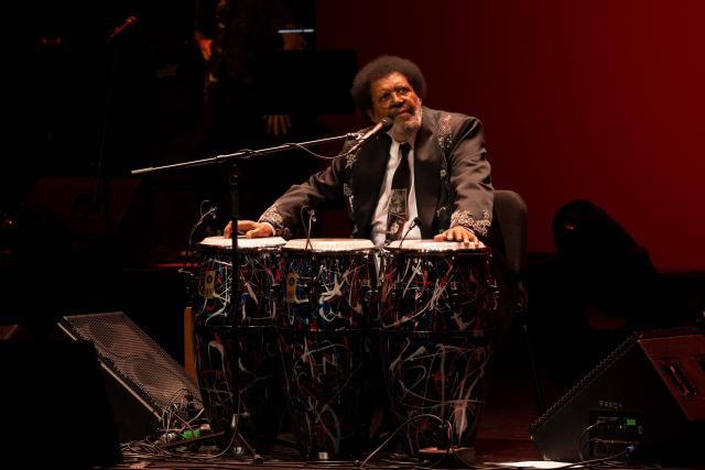 (FILES) Uruguayan singer songwriter Ruben Rada performs during his show "Rada 80 Años" celebrating his 80th birthday, at the Sodre theatre in Montevideo, on August 22, 2023. Uruguayan musician and composer Ruben Rada, who forged a distinctive musical identity by blending candombe with genres such as rock and jazz, died of pneumonia at the age of 83 on August 26, 2026, his family announced. (Photo by Pablo PORCIUNCULA / AFP)