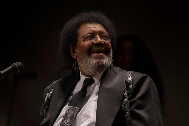 (FILES) Uruguayan singer songwriter Ruben Rada performs during his show "Rada 80 Años" celebrating his 80th birthday, at the Sodre theatre in Montevideo, on August 22, 2023. Uruguayan musician and composer Ruben Rada, who forged a distinctive musical identity by blending candombe with genres such as rock and jazz, died of pneumonia at the age of 83 on August 26, 2026, his family announced. (Photo by Pablo PORCIUNCULA / AFP)