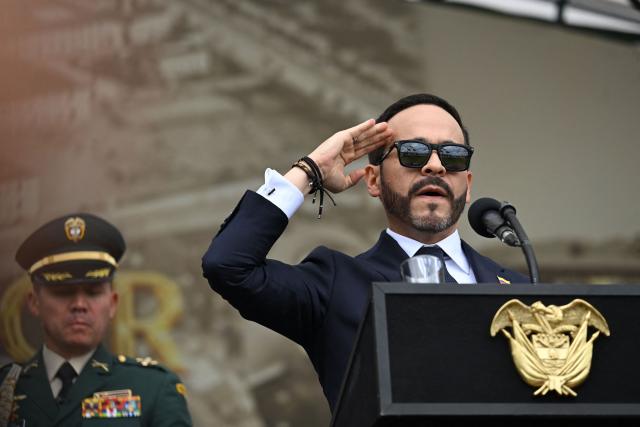 Colombia's President Abelardo de la Espriella delivers a speech during the change of command ceremony at the Jose Maria Cordova Military School in Bogota on August 26, 2026. Colombia's new hard-right government announced on August 25, 2026, plans to classify guerrilla fighters, drug traffickers and other criminal groups as "terrorists." (Photo by Raul ARBOLEDA / AFP)