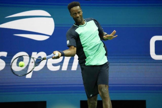 France's Gael Monfils hits a forehand during the mixed doubles semi-finals tennis match against Switzerland's Belinda Bencic and Italy's Flavio Cobolli during the 2026 US Open tennis tournament at the USTA Billie Jean King National Tennis Center in New York on August 26, 2026. (Photo by TIMOTHY A. CLARY / AFP)
