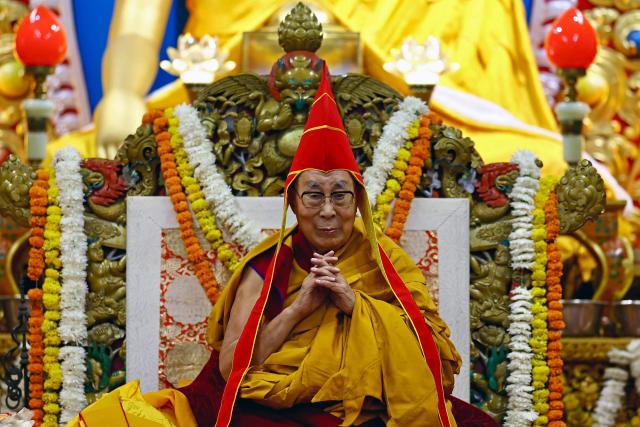 (FILES) Tibetan spiritual leader the Dalai Lama attends a long-life prayer offering ceremony at the Main Tibetan Temple in McLeod Ganj, near Dharamsala on July 5, 2025. Buddhist spiritual leader the Dalai Lama said on August 27 that he was praying for all those killed in devastating floods in Nepal and Tibet. (Photo by Niharika KULKARNI / AFP)