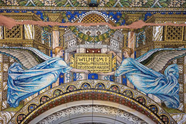 A ceiling mosaic with a dedication to Wilhelm I (William I), King of Prussia, is pictured at the Kaiser Wilhelm Memorial Church (Kaiser-Wilhelm-Gedächtniskirche) in Berlin on August 27, 2026. The Kaiser Wilhelm Memorial Church in Berlin is to undergo renovation over the next three years at a cost of around 40 million euros. In the historic part of the church, the mosaics will be secured, the exhibition renewed, and the ruined tower made accessible to visitors, as Arne Herz, chairman of the Kaiser Wilhelm Memorial Church Foundation, announced. In the adjacent buildings from the 1960s, the concrete honeycomb structures and the blue glass windows, among other things, will be refurbished. (Photo by Odd ANDERSEN / AFP)