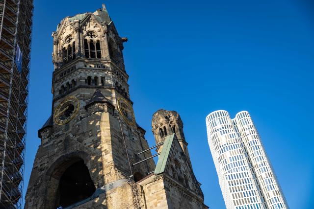 Outside view of the Kaiser Wilhelm Memorial Church (Kaiser-Wilhelm-Gedächtniskirche) that was not rebuilt as a reminder of World War II, in Berlin on August 27, 2026. The Kaiser Wilhelm Memorial Church in Berlin is to undergo renovation over the next three years at a cost of around 40 million euros. In the historic part of the church, the mosaics will be secured, the exhibition renewed, and the ruined tower made accessible to visitors, as Arne Herz, chairman of the Kaiser Wilhelm Memorial Church Foundation, announced. In the adjacent buildings from the 1960s, the concrete honeycomb structures and the blue glass windows, among other things, will be refurbished. (Photo by Odd ANDERSEN / AFP)