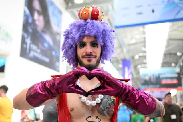 A cosplayer is pictured at the Gamescom video games trade fair on the fair grounds in Cologne, western Germany, on August 27, 2026. The 2026 edition of the vast Gamescom trade fair in Cologne, Germany, had its opening night on August 25, 2025 and will be running from August 26 to 30, 2026. (Photo by Ina FASSBENDER / AFP)