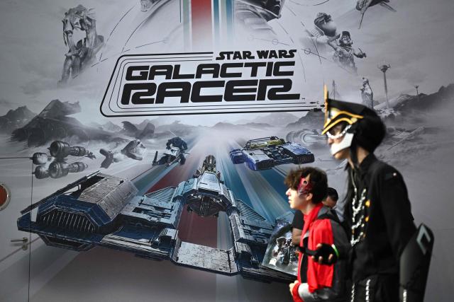 Gamers are seen at the "Star Wars: Galactic Racer" video game stand of Studio Fuse Games during the Gamescom video games trade fair on the fair grounds in Cologne, western Germany, on August 27, 2026. The 2026 edition of the vast Gamescom trade fair in Cologne, Germany, had its opening night on August 25, 2025 and will be running from August 26 to 30, 2026. (Photo by Ina FASSBENDER / AFP)