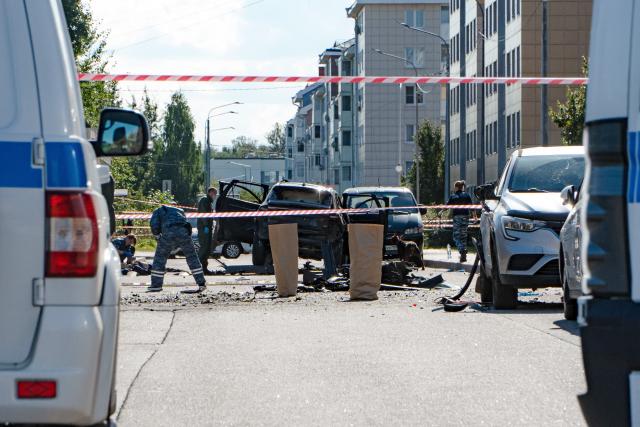 Investigators work at the scene of a car explosion in Saint Petersburg on August 27, 2026. A car explosion killed one person in Saint Petersburg on August 27, 2026, Russian investigators said, with Russian media reporting it was an army officer in what appeared to be the latest assassination during the Ukraine war. (Photo by AFP)
