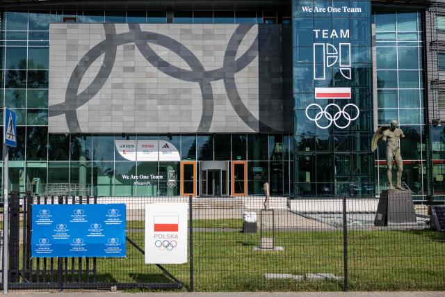 A photo taken on 27 August 2026 shows the entrance of the building of the Olympic Centre in Warsaw, where the Polish Olympic Committee has its headquarters. Police on August 27, 2026 arrested the head of the Polish Olympic Committee on suspicion that he took bribes from a crypto trader in return for sponsorship deals, officials said. (Photo by Wojtek RADWANSKI / AFP)
