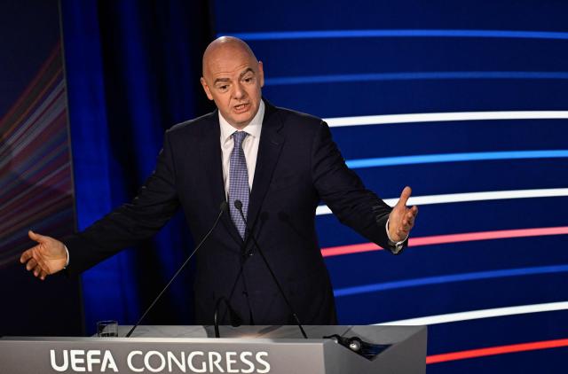 (FILES) President of FIFA Gianni Infantino gestures as he delivers a speech during the 48th UEFA ordinary Congress held at the Maison de la Mutualite in Paris on February 8, 2024. UEFA is preparing a complaint under Swiss law against FIFA president Gianni Infantino for “unfair management”, following his failed plan to open up the World Cup to private investors, it was revealed on August 27, 2026 by a source close to the matter. (Photo by JULIEN DE ROSA / AFP)