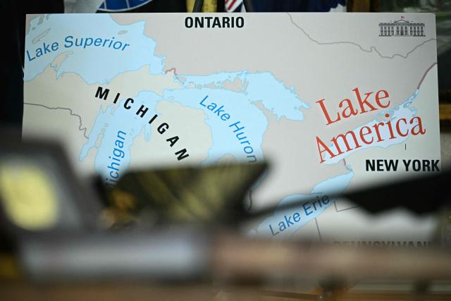 A map is displayed as US President Donald Trump signs an executive order that aims to rename Lake Ontario to Lake America in the Oval Office of the White House in Washington, DC, on August 27, 2026. (Photo by Jim WATSON / AFP)