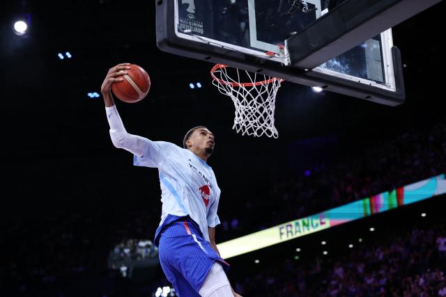 France's #32 Victor Wembanyama warms up before the FIBA Basketball World Cup 2027 European Qualifier game between France and Slovenia at the Palais Omnisports de Paris-Bercy, in Paris on August 27, 2026. (Photo by SIMON WOHLFAHRT / AFP)