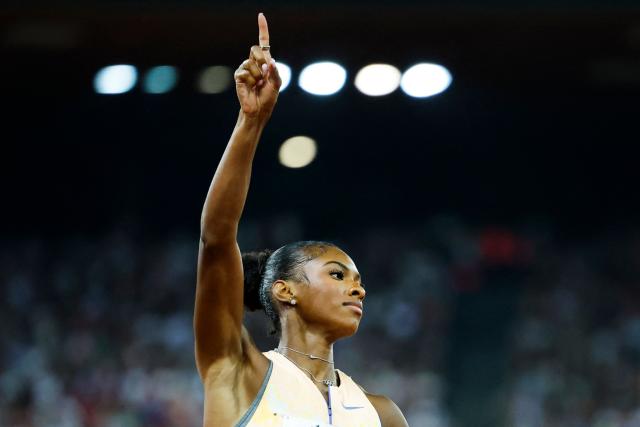 US' Masai Russell celebrates as she crosses the finish line to win the women's 100m hurdles and breaks the world record during the IAAF Diamond League athletics meeting, at the Letzigrund Stadium, in Zurich on August 27, 2026. (Photo by Stefan Wermuth / AFP)