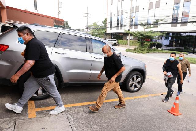 Mexican migrants arrive at the Mexican consulate after being deported aboard a US military aircraft to Ramon Villeda Morales International Airport in San Pedro Sula, 180 km north of Tegucigalpa, on August 27, 2026. (Photo by AFP)