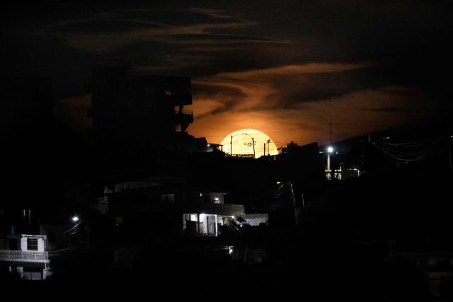 A waxing gibbous moon is seen over Catia La Mar, Vargas state, Venezuela, at dawn on August 27, 2026. (Photo by Federico PARRA / AFP)