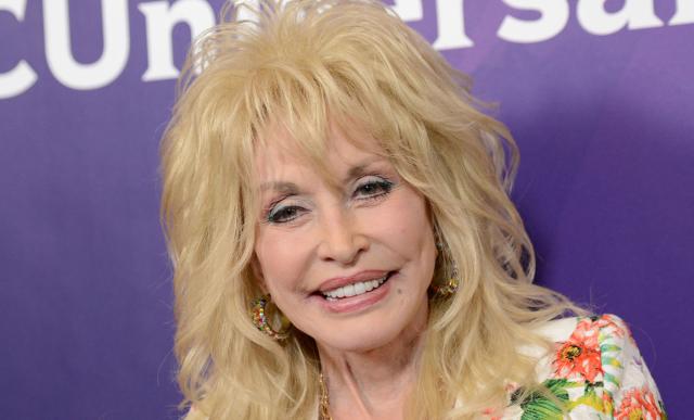 (FILES) US singer and actress Dolly Parton attends the 2015 NBC TCA summer press tour at the Beverly Hilton Hotel in Beverly Hills, California on August 13, 2015. Parton, the country music star who rose from grinding poverty in Tennessee to become a rhinestone-studded cultural icon with hits like "Jolene" and "9 to 5," has died at 80, her family said on August 25, 2026. Parton was more than a singer, she wrote 3,000 songs, acted in major Hollywood films and donated millions of dollars to charities in her home state and beyond. (Photo by Chris DELMAS / AFP)