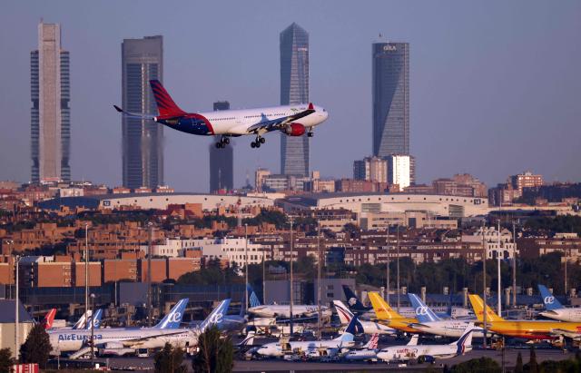 A picture taken on August 28, 2026 shows an Venezuelan Laser airlines' Airbus A330 landing at Madrid's Barajas Airport. (Photo by Thomas COEX / AFP)