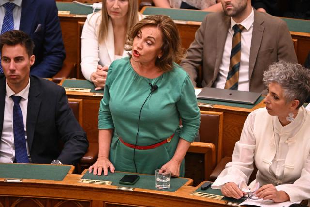 Member of the parliament, Andrea Rost (C), soprano of the Metropolitan Opera, La Scala and the Vienna State Opera speaks prior to voting by MP's on Hungarian political scientist Anna Unger candidacy as the head of the National Asset Recovery and Asset Protection Office (NVVH) In Budapest on August 28, 2026, (Photo by Attila KISBENEDEK / AFP)