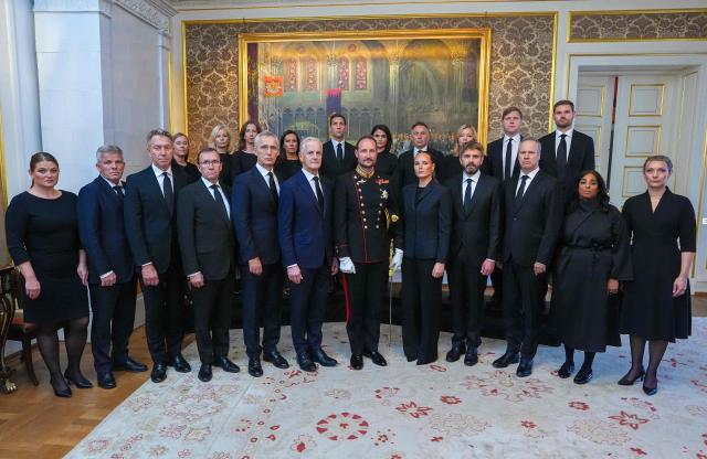 King Haakon of Norway (C L) and Princess Ingrid Alexandra of Norway (C, R) pose for a photo with members of the government including Prime MInister Jonas Gahr Store (6th L) after they met for an extraordinary cabinet meeting at the Royal Palace, in Oslo on August 28, 2026, following thre death of King Harald V of Norway. King Harald V of Norway, who died on August 28, 2026 aged 89, remained a unifying figure in his country until the very end, a pillar of stability amid a string of family scandals that tarnished the final years of his reign. (Photo by Lise Åserud / NTB / AFP) / Norway OUT