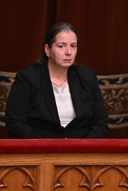 Hungarian political scientist Anna Unger, candidate as the head of the National Asset Recovery and Asset Protection Office (NVVH) attends the vote at the Parliament in Budapest on August 28, 2026. (Photo by Attila KISBENEDEK / AFP)
