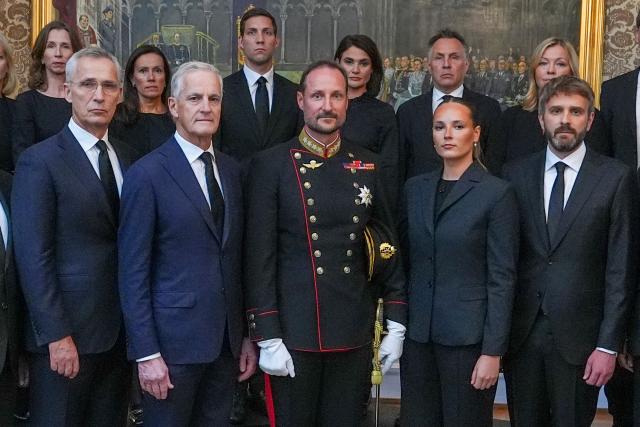 (From L) Norway's Finance Minister Jens Stoltenberg, Norwegian Prime Minister Jonas Gahr Store, Norway's new King Haakon VIII and Norway's Crown Princess Ingrid Alexandra pose for a picture with members of the Norwegian government during an extraordinary cabinet meeting at the Royal Palace, following the death of King Harald V, in Oslo, Norway, on August 28, 2026. King Harald V of Norway, who died on August 28, 2026 aged 89, remained a unifying figure in his country until the very end, a pillar of stability amid a string of family scandals that tarnished the final years of his reign. (Photo by Lise Åserud / NTB / AFP) / Norway OUT