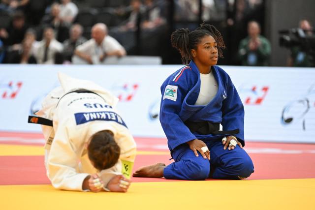 France's Sarah-Leonie Cysique (Blue) reacts next to Russia's Natalia Elkina in the women's under 57 kg semi final bout at the Lausanne Grand Slam judo tournament, part of the IJF World Judo Tour, in Prilly on August 28, 2026. (Photo by Fabrice COFFRINI / AFP)