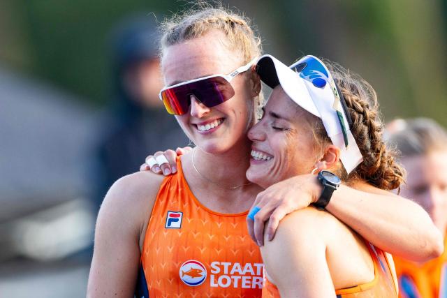 Netherlands' Roos de Jong and Benthe Boonstra react after the women's double sculls final on the fifth day of the World Rowing Championships at the Bosbaan in the Amsterdam Forest, in Amsterdam, on August 28, 2026. (Photo by Iris van den Broek / various sources / AFP) / Netherlands OUT