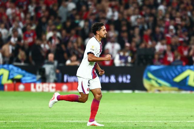 Paris Saint-Germain's Brazilian defender #05 Marquinhos celebrates scoring his team's second goal during the French L1 football match between Lille LOSC and Paris Saint-Germain (PSG) at the Stade Pierre-Mauroy in Villeneuve-d'Ascq, northern France, on August 28, 2026. (Photo by Sameer AL-DOUMY / AFP)