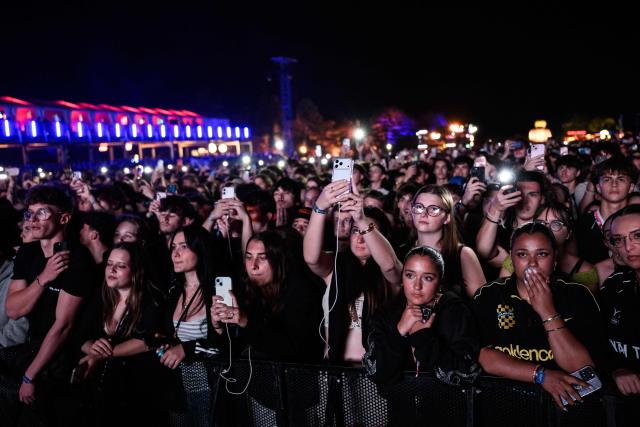 Spectators attend the Golden Coast rap festival in Corcelles-les-Monts, near Dijon in central-eastern France, on August 28, 2026. (Photo by ARNAUD FINISTRE / AFP)