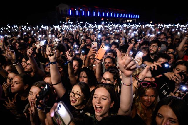 Spectators attend the Golden Coast rap festival in Corcelles-les-Monts, near Dijon in central-eastern France, on August 28, 2026. (Photo by ARNAUD FINISTRE / AFP)