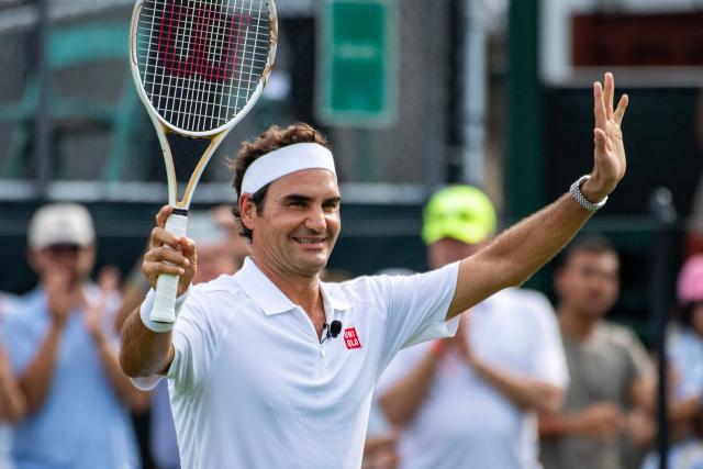 Swiss former tennis player Roger Federer, Class of 2026 Inductee, waves to fans during the International Tennis Hall of Fame Celebrity Pro Classic in Newport, Rhode Island, on August 28, 2026.  (Photo by Joseph Prezioso / AFP)