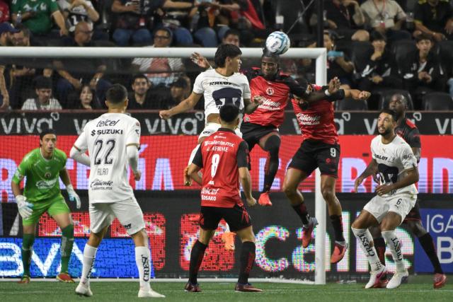 Tijuana's Ecuadorian defender #12 Jackson Porozo heads the ball during the Liga MX Apertura tournament football match between Tijuana and Pumas at the Caliente stadium in Tijuana, Baja California state, Mexico, on August 28, 2026. (Photo by Guillermo Arias / AFP)